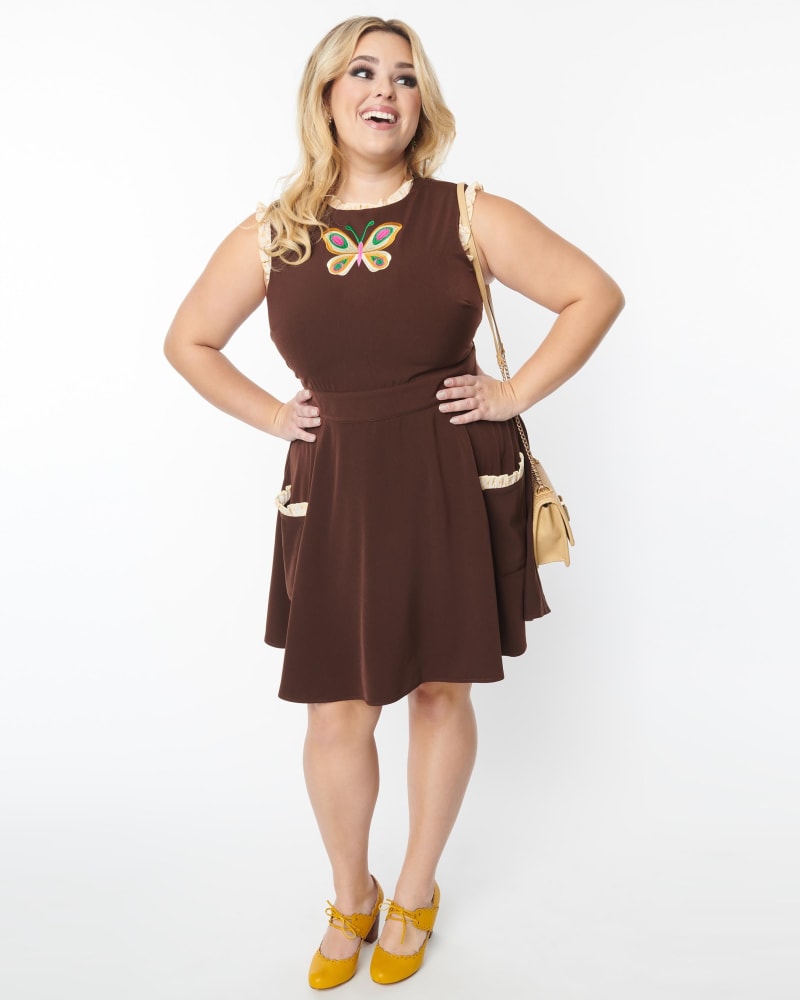 Front of a model wearing a size 1X/16 Smak Parlour Plus Size Brown & Butterfly Happy Hour Flare Dress in Brown & Butterfly by Smak Parlour. | dia_product_style_image_id:269312